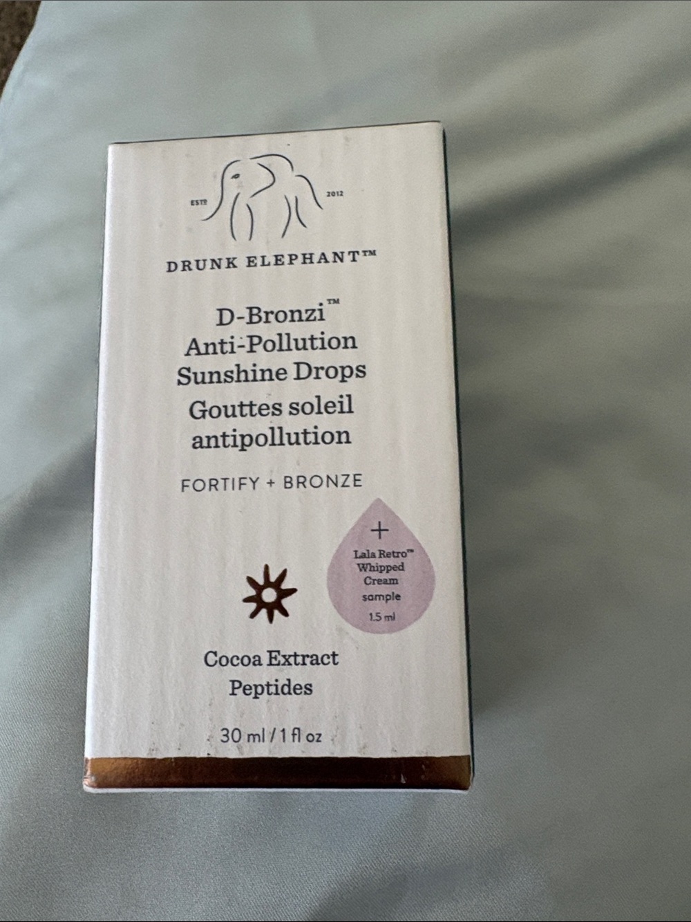 Drunk Elephant D-Bronzi Anti-Pollution Sunshine Drops — white, rose, bronze
